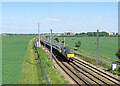 TL4653 : Great Shelford: stock for scrap at Shepreth Branch Junction by John Sutton