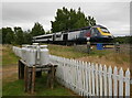 NN7399 : Train passing Aultlarie Halt by Craig Wallace