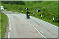 NG9713 : Motorcyclist on the A87 in Glen Shiel by David Dixon