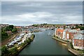 NZ8910 : View north along the River Esk from Whitby New Bridge by Jeff Buck