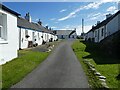 NM7313 : Luing - Cullipool - Double sided row of whitewashed cottages by Rob Farrow