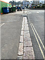 SX9676 : Kerb, Station Road, Dawlish by Robin Stott