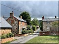 SU7499 : Brick and flint cottages, Crowell by Simon Mortimer