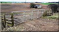 NY5160 : Field gateway and barn in field on north side of Carlisle Road by Roger Templeman