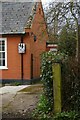 TM4269 : Darsham: pre-Worboys school sign on former school building by Christopher Hilton