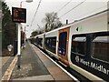 SP1092 : A train at Eddington Station by David Lally