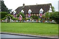 SO9036 : Union jacks on School Farmhouse by Philip Halling