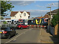 SU9745 : Level crossing in Farncombe by Malc McDonald