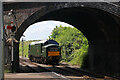 SO9525 : D6948 running round at Cheltenham Race Course Station by Chris Allen