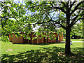 TQ2679 : Serpentine Gallery Pavilion 2023, view with tree leaves by David Hawgood