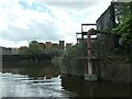 SJ4076 : Pipeline entering the Shropshire Union canal by Christine Johnstone