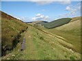 NT2416 : Path below Peniestone Knowe by Adrian Taylor