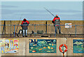 NT6779 : Sea anglers at Victoria Harbour, Dunbar by Walter Baxter