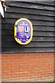 TG2322 : Defibrillator on Buxton Village Hall by Geographer