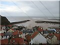 NZ7818 : Over rooftops  to  Staithes  Harbour  (2) by Martin Dawes