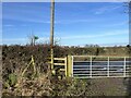 SJ7551 : Footpath sign and stile by Jonathan Hutchins