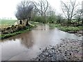 NZ0071 : Flooded road near Shellbraes Farm by Oliver Dixon