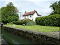 SP9213 : Canalside cottage beside Marsworth Locks by Jeremy Bolwell