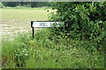 TL9890 : Mill Lane sign by Geographer