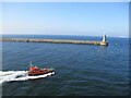 NZ3868 : Tyne  pilot  boat  Hadrian  with  North  Pier  beyond by Martin Dawes