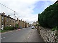 NY9938 : View along Front Street in Stanhope by Robert Graham