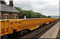 SD7891 : A rake of new wagons passing through Garsdale Station on route for Crewe by Luke Shaw