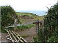  : Distressed farm gate near Tregarverne by John Lucas