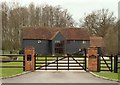 TQ5398 : Converted barn at Rose Hall Farm by Robert Edwards