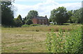 TM3482 : A house set back from the lane at All Saints South Elmham by Andrew Hill