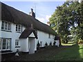 SX7483 : Row of Thatched Cottages in North Bovey by Sarah Charlesworth