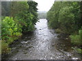 NX9891 : Water of Ae flowing south by Ian Porter