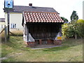 TM4160 : Friston Bus Shelter & Friston Village Sign by Geographer