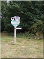 TF6628 : Wolferton Village Sign by Tony Bennett