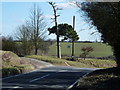 TM0750 : Road to Somersham from the church gateway by Andrew Hill