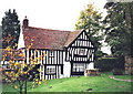 SO7483 : Beamed house in Highley churchyard, Shropshire by nick macneill