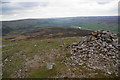 NZ0100 : The cairn at the top of Calver Hill by Bill Boaden