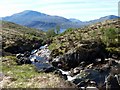 NG9904 : Downstream along Coire nan Eiricheallach by Alan Reid