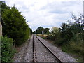 TM4163 : Looking along the railway line to Leiston by Geographer