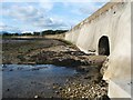 NS3181 : The Red Burn flowing through a sea wall by Lairich Rig