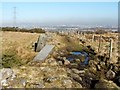 NS4860 : Dry-stone wall and fence by Lairich Rig