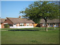 TQ8219 : Bungalows on Northiam Road by Oast House Archive