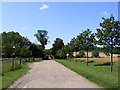 TM3864 : Footpath to Carlton Park, Carlton Hall & St.Peter's Church by Geographer