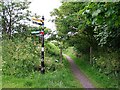 NU2131 : Signpost and footpath by Rose and Trev Clough