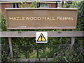 TM4358 : Hazlewood Hall Farm sign by Geographer