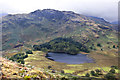 NY2904 : Blea Tarn from the path up Mart Crag (set of 2 images) by Ian Greig