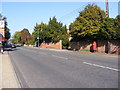 TM2749 : B1438 Melton Road & Melton Road Postbox by Geographer