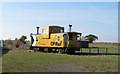 TQ9498 : Canadian caboose on Essex siding by Roger Jones