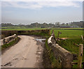 SD4481 : Bridge over a drainage ditch on the Cumbria Coastal Way by Ian Greig