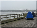 TM2521 : Walton on the Naze: anglers tents on the pier by Chris Downer