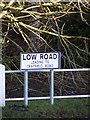 TM2677 : Low Road sign by Geographer